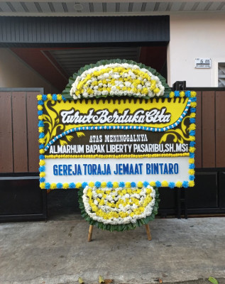 Papan Bunga Duka di Wara